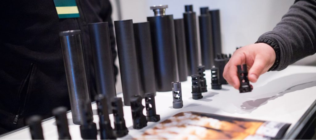 a man browses different options for a suppressor
