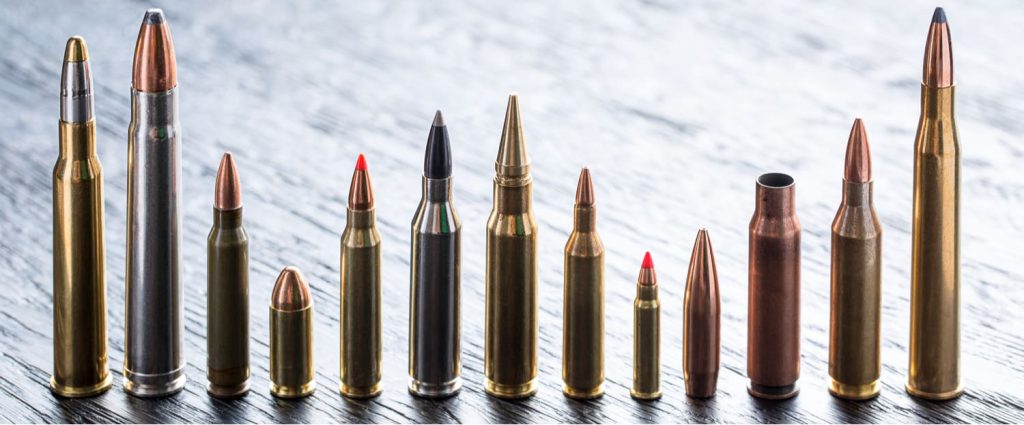a line of different calibers of cartridges