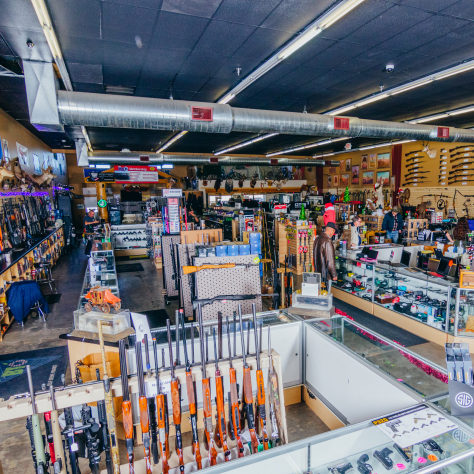 the hub gun store with different guns and accessories